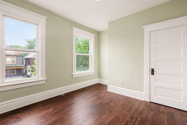 572 Linwood Ave, Columbus, OH 43205 - spare room featuring dark wood-style flooring