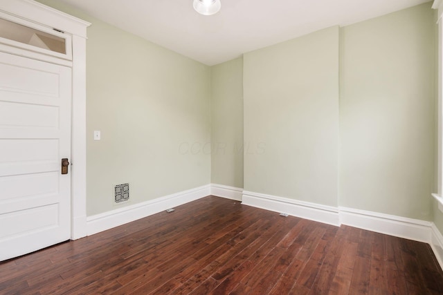 572 Linwood Ave, Columbus, OH 43205 - unfurnished room featuring dark wood finished floors and baseboards