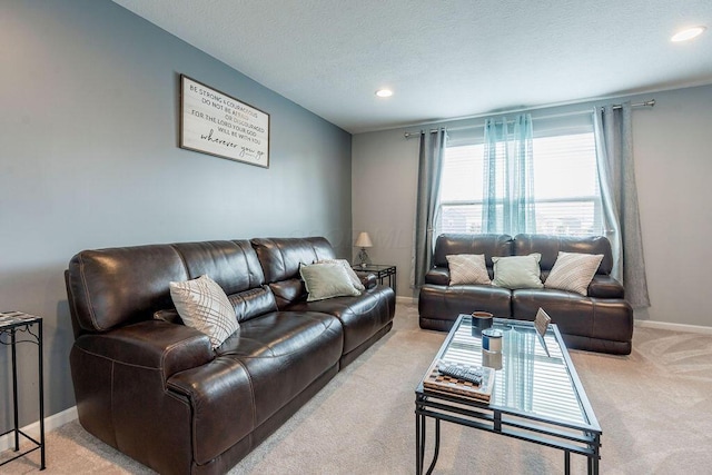 123 Schellinger St, Delaware, OH 43015 - living room featuring light colored carpet, recessed lighting, and a textured ceiling