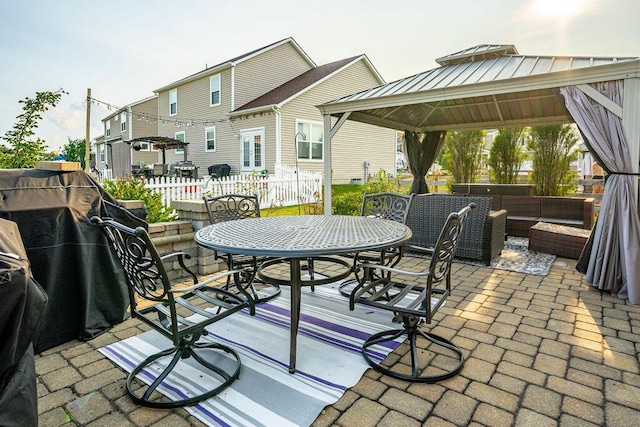 123 Schellinger St, Delaware, OH 43015 - view of patio featuring a gazebo, outdoor lounge area, and outdoor dining space