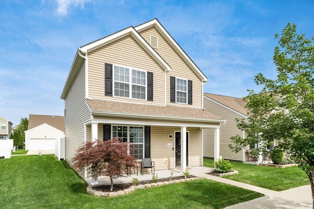 2020 Edison St, Newark, OH 43055 - traditional-style house featuring a porch, a front lawn, and a detached garage