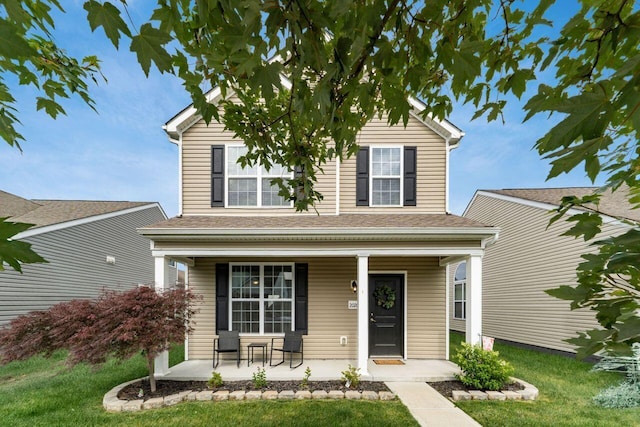 2020 Edison St, Newark, OH 43055 - traditional home with a porch, a front yard, and a shingled roof