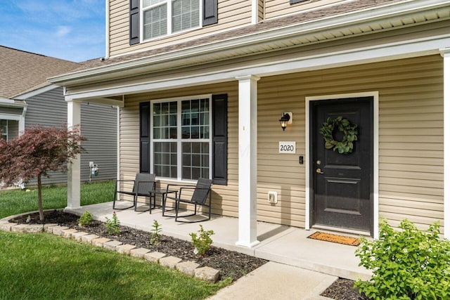 2020 Edison St, Newark, OH 43055 - property entrance with covered porch and a shingled roof