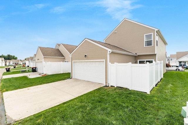 2020 Edison St, Newark, OH 43055 - view of property exterior with an attached garage, concrete driveway, and a residential view