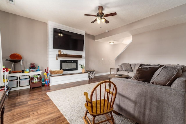 2020 Edison St, Newark, OH 43055 - living area featuring a fireplace, wood finished floors, and a ceiling fan