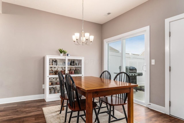 2020 Edison St, Newark, OH 43055 - dining room with a chandelier and dark wood finished floors