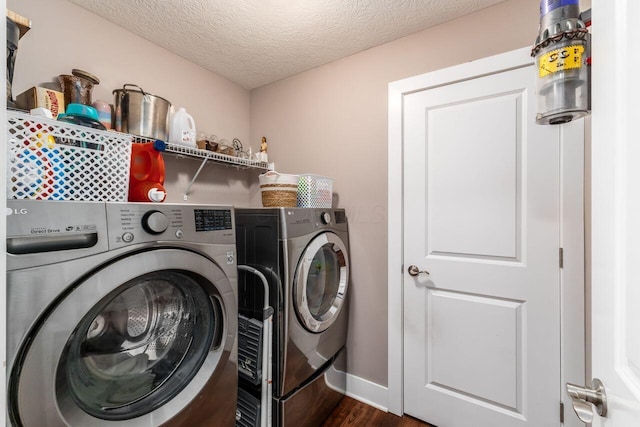 2020 Edison St, Newark, OH 43055 - laundry room with independent washer and dryer, dark wood-style flooring, and a textured ceiling