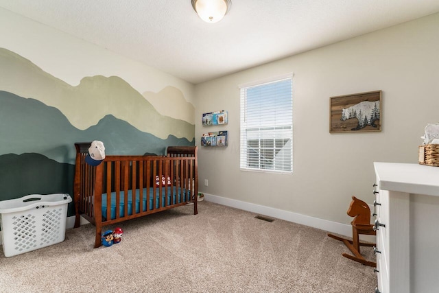 2020 Edison St, Newark, OH 43055 - bedroom with carpet and a crib