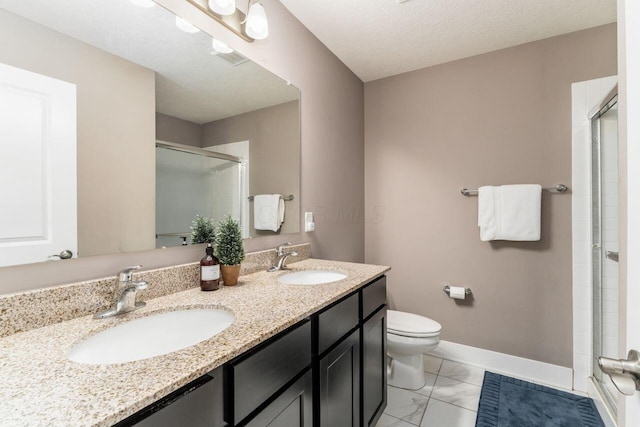 2020 Edison St, Newark, OH 43055 - bathroom with a shower stall, marble look tiles, and double vanity