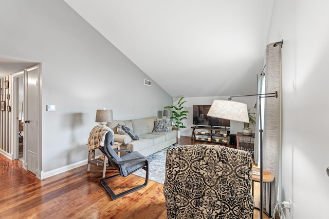 1080 Merrimar Cir S Unit E, Columbus, OH 43220 - living area with lofted ceiling and wood finished floors