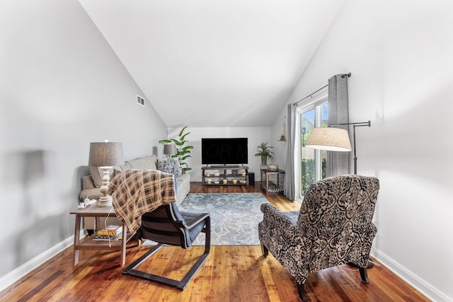 1080 Merrimar Cir S Unit E, Columbus, OH 43220 - living area with vaulted ceiling and wood finished floors