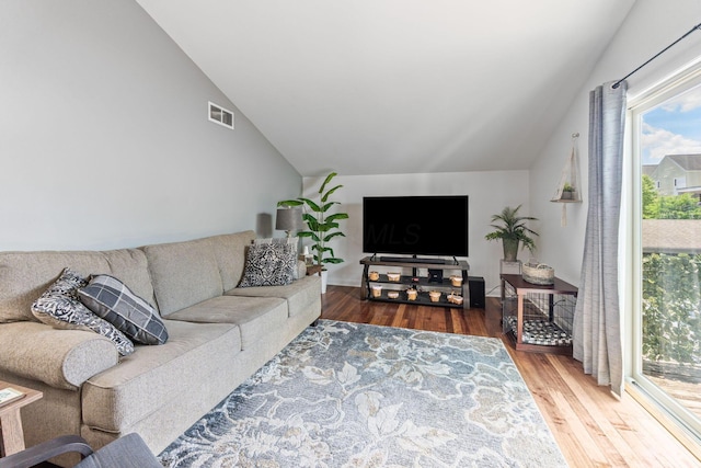 1080 Merrimar Cir S Unit E, Columbus, OH 43220 - living area featuring lofted ceiling and wood finished floors