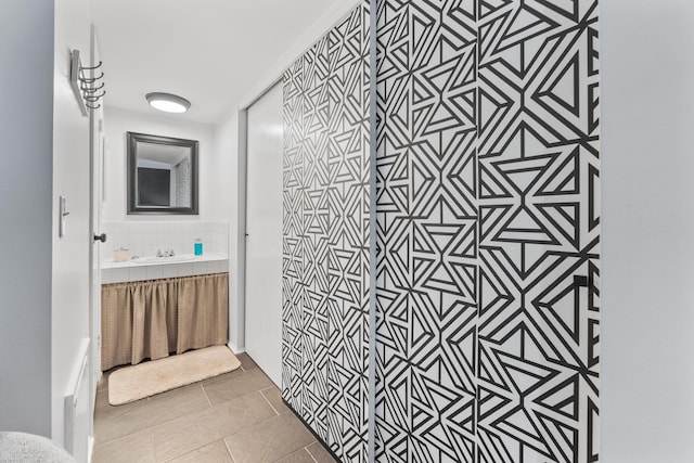 1080 Merrimar Cir S Unit E, Columbus, OH 43220 - bathroom featuring vanity, tile patterned flooring, and a shower