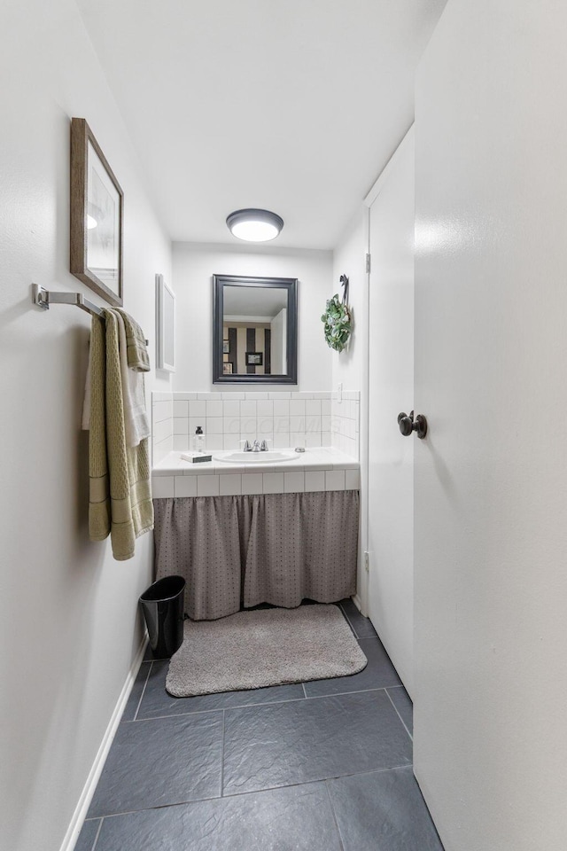 1080 Merrimar Cir S Unit E, Columbus, OH 43220 - bathroom with vanity and baseboards