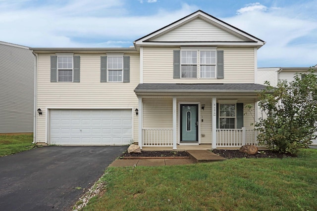 4686 Willowburn Dr, Columbus, OH 43207 - traditional home featuring driveway, an attached garage, a porch, and a front yard