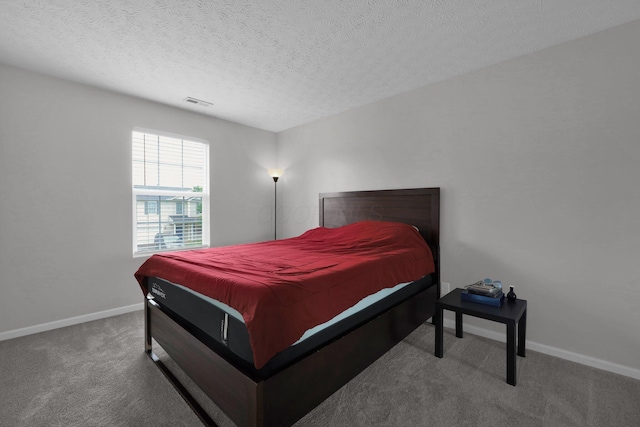 4686 Willowburn Dr, Columbus, OH 43207 - carpeted bedroom featuring baseboards and a textured ceiling