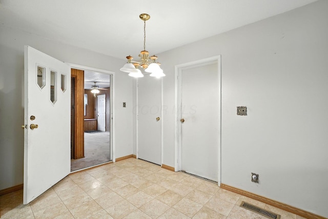 814 Gilmore Dr, Reynoldsburg, OH 43068 - unfurnished room featuring a chandelier and baseboards