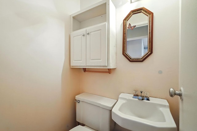 814 Gilmore Dr, Reynoldsburg, OH 43068 - half bathroom with a sink and toilet