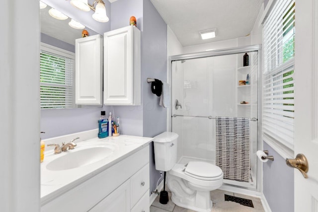 8711 Blessing Dr, Powell, OH 43065 - full bathroom featuring a stall shower, vanity, and tile patterned floors
