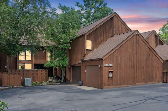 4968 Wintersong Ln Unit 10, Westerville, OH 43081 - contemporary house featuring a shingled roof, driveway, and an attached garage