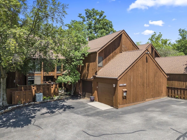 4968 Wintersong Ln Unit 10, Westerville, OH 43081 - view of front facade with a shingled roof and asphalt driveway