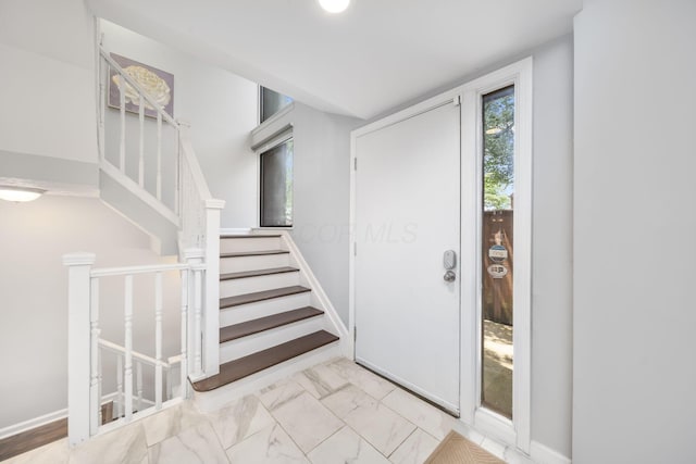 4968 Wintersong Ln Unit 10, Westerville, OH 43081 - entryway with stairs and marble look tiles