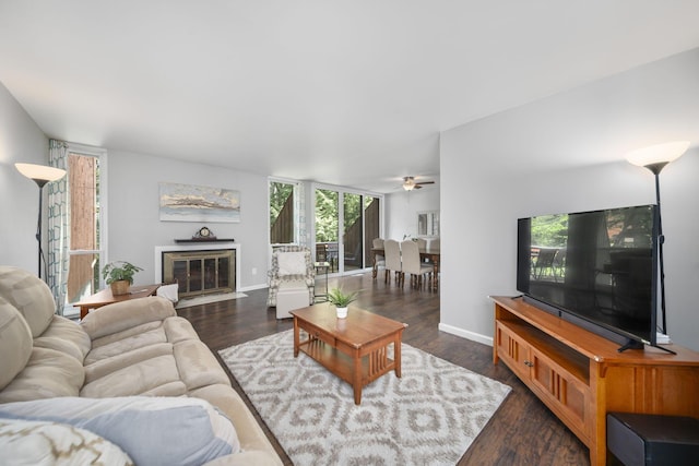4968 Wintersong Ln Unit 10, Westerville, OH 43081 - living room with a ceiling fan, wood finished floors, and a fireplace with flush hearth