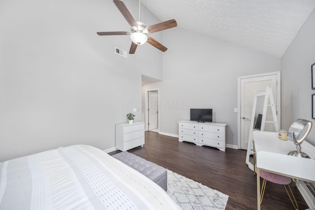 4968 Wintersong Ln Unit 10, Westerville, OH 43081 - bedroom with dark wood finished floors, high vaulted ceiling, and ceiling fan