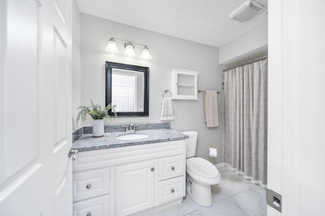 4968 Wintersong Ln Unit 10, Westerville, OH 43081 - bathroom featuring marble look tiles, vanity, a textured ceiling, and a shower with curtain