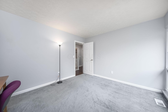 4968 Wintersong Ln Unit 10, Westerville, OH 43081 - unfurnished bedroom featuring carpet flooring and a textured ceiling