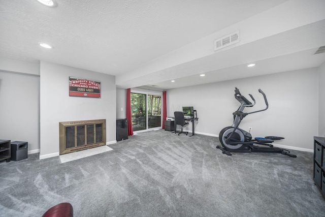 4968 Wintersong Ln Unit 10, Westerville, OH 43081 - exercise area with a fireplace with flush hearth, recessed lighting, carpet floors, and a textured ceiling