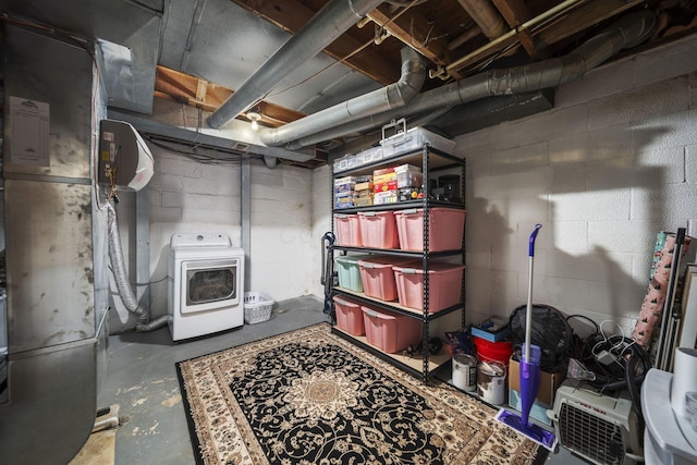 4968 Wintersong Ln Unit 10, Westerville, OH 43081 - unfinished below grade area featuring washer / clothes dryer, heating unit, and concrete block wall