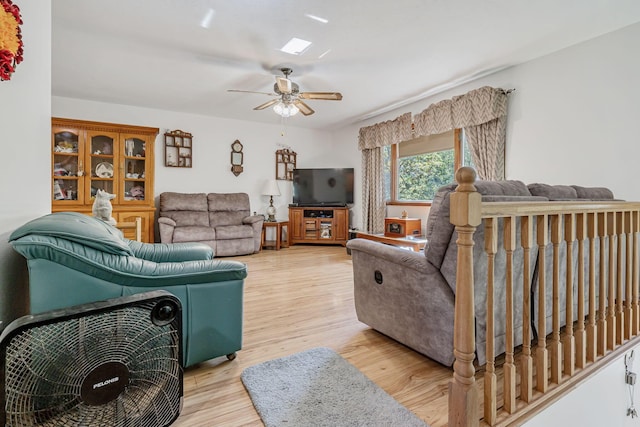 4250 Herr Fieldhouse Rd, Southington, OH 44470 - living area featuring a ceiling fan and wood finished floors