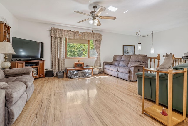 4250 Herr Fieldhouse Rd, Southington, OH 44470 - living room with a ceiling fan and light wood-style flooring