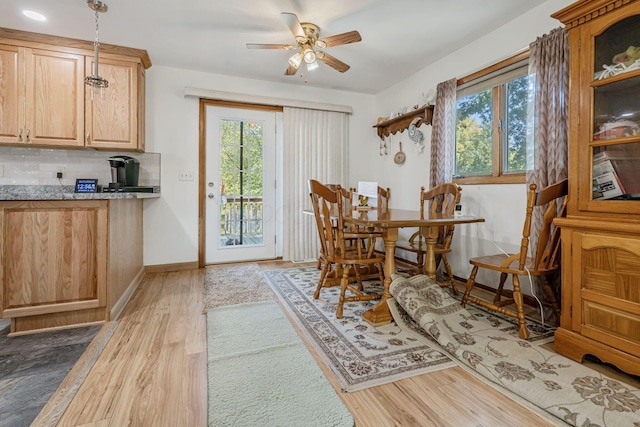 4250 Herr Fieldhouse Rd, Southington, OH 44470 - dining room featuring a ceiling fan and wood finished floors