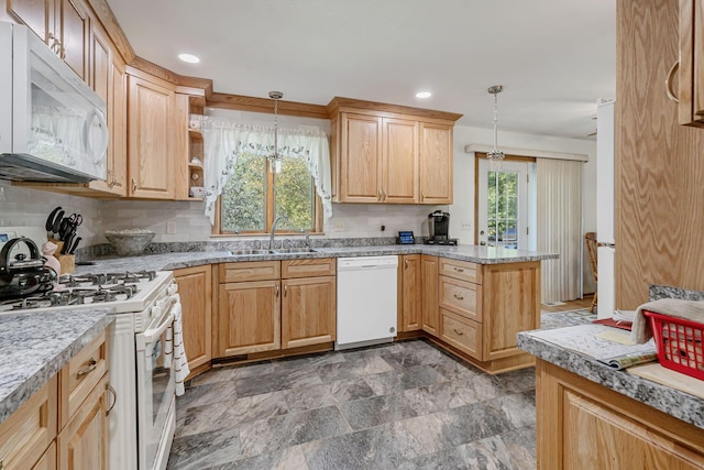 4250 Herr Fieldhouse Rd, Southington, OH 44470 - kitchen with white appliances, light countertops, a peninsula, light brown cabinetry, and hanging light fixtures