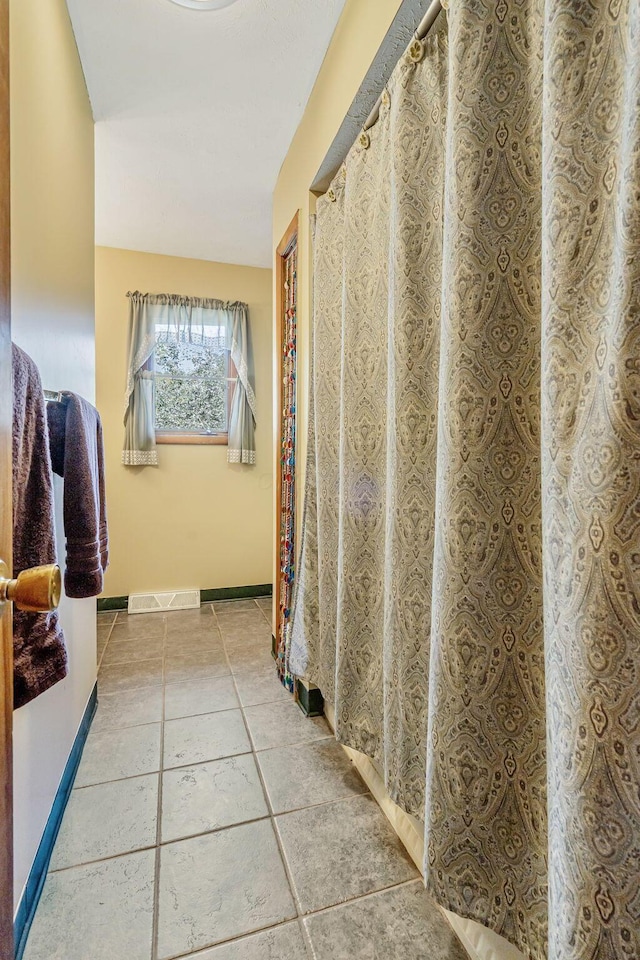 4250 Herr Fieldhouse Rd, Southington, OH 44470 - full bath with tile patterned floors and baseboards