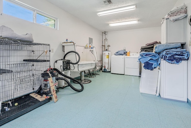 4250 Herr Fieldhouse Rd, Southington, OH 44470 - garage featuring independent washer and dryer and water heater
