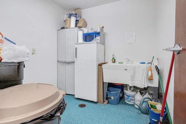 4250 Herr Fieldhouse Rd, Southington, OH 44470 - laundry room with tile patterned floors and washer / dryer