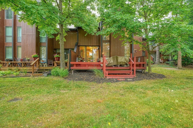 4883 Powderhorn Ln Unit 3, Westerville, OH 43081 - back of property with a lawn and a wooden deck