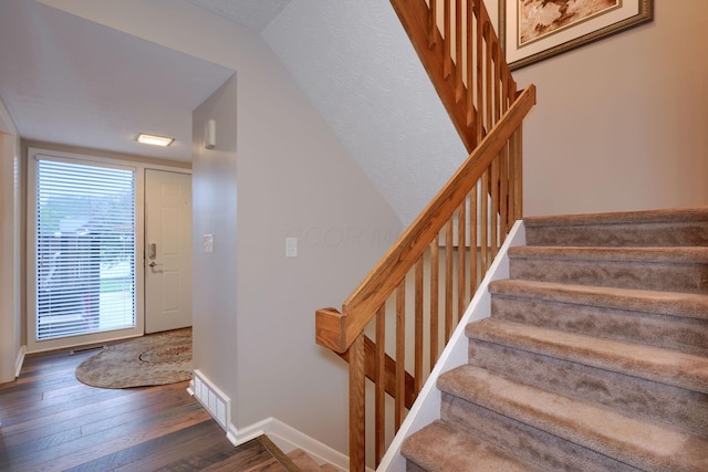 4883 Powderhorn Ln Unit 3, Westerville, OH 43081 - staircase featuring wood finished floors and baseboards