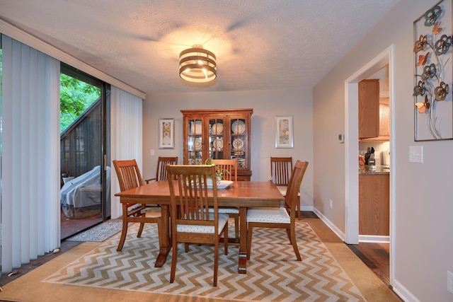 4883 Powderhorn Ln Unit 3, Westerville, OH 43081 - dining space with a textured ceiling and baseboards