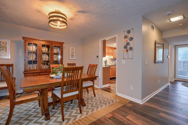 4883 Powderhorn Ln Unit 3, Westerville, OH 43081 - dining room featuring wood finished floors and a textured ceiling