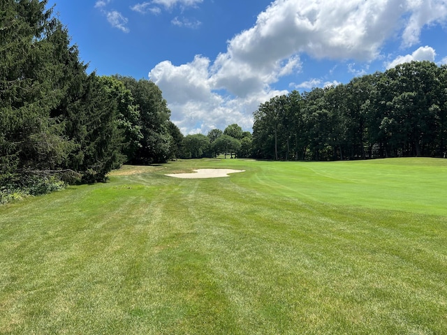 4883 Powderhorn Ln Unit 3, Westerville, OH 43081 - view of property's community with golf course view, a lawn, and view of scattered trees
