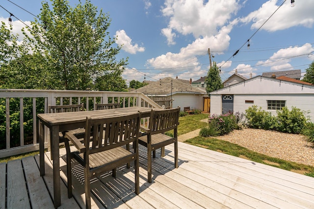338 Sheldon Ave, Columbus, OH 43207 - wooden deck with outdoor dining space and an outbuilding