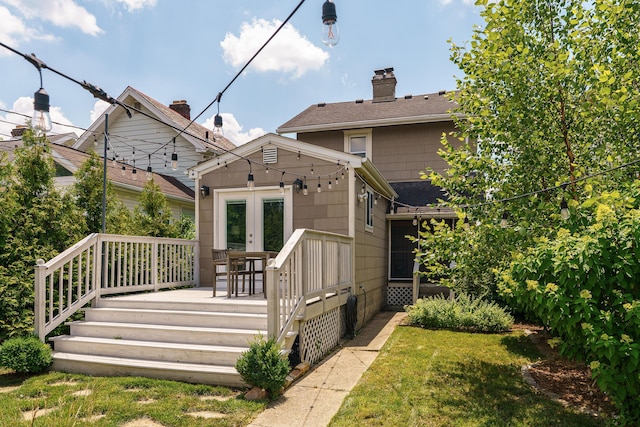 338 Sheldon Ave, Columbus, OH 43207 - back of house with a deck, french doors, a lawn, and a chimney