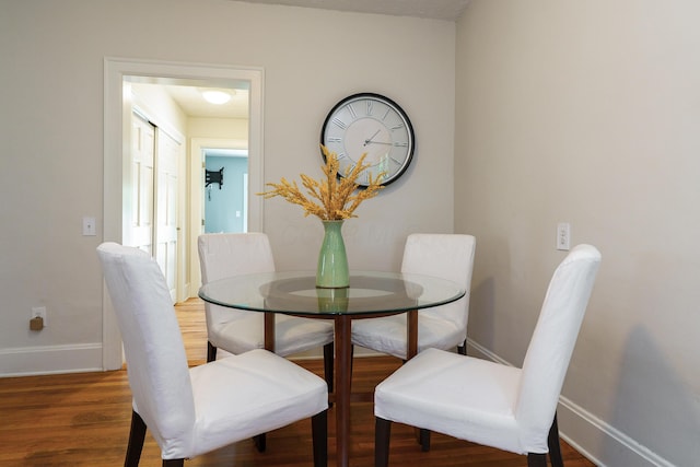 338 Sheldon Ave, Columbus, OH 43207 - dining area with baseboards and wood finished floors