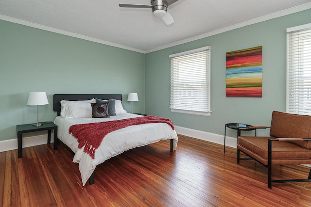 338 Sheldon Ave, Columbus, OH 43207 - bedroom featuring ornamental molding, wood-type flooring, multiple windows, and a ceiling fan