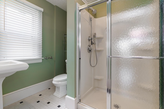 338 Sheldon Ave, Columbus, OH 43207 - full bath featuring a shower stall, tile patterned floors, and plenty of natural light