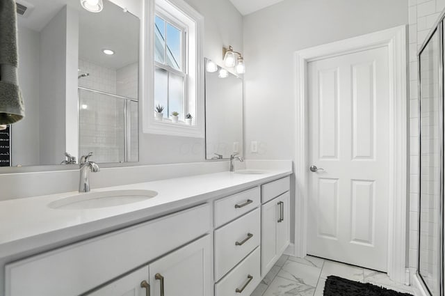 1877 Poplar Pl, Lewis Center, OH 43035 - full bathroom with marble finish flooring, a stall shower, double vanity, and recessed lighting